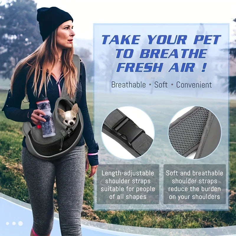 A woman is wearing a breathable dog sling carrier on her chest while outdoors.