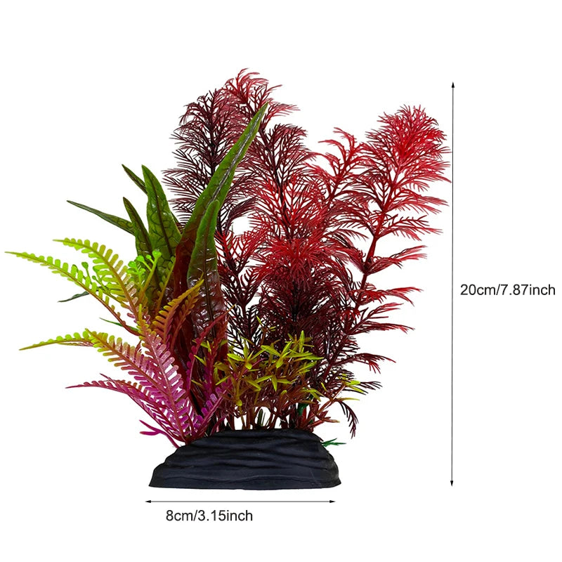 Arrangement dense de plantes aquatiques artificielles aux feuillages rouges et roses vifs dans un pot noir.