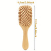 A wooden bamboo hair brush with massage bristles shown vertically, measuring 6.5cm wide and 21.5cm long.