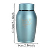 A teal stainless steel pet memorial storage box with a lid, shown in a vertical view.