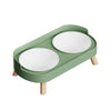 A light green stainless steel double bowl for dogs and cats with wooden legs.