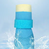 A yellow and blue waterproof anti-slip dog boot is shown splashing water in the ocean.