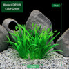 Green artificial aquarium plants growing in a rock environment