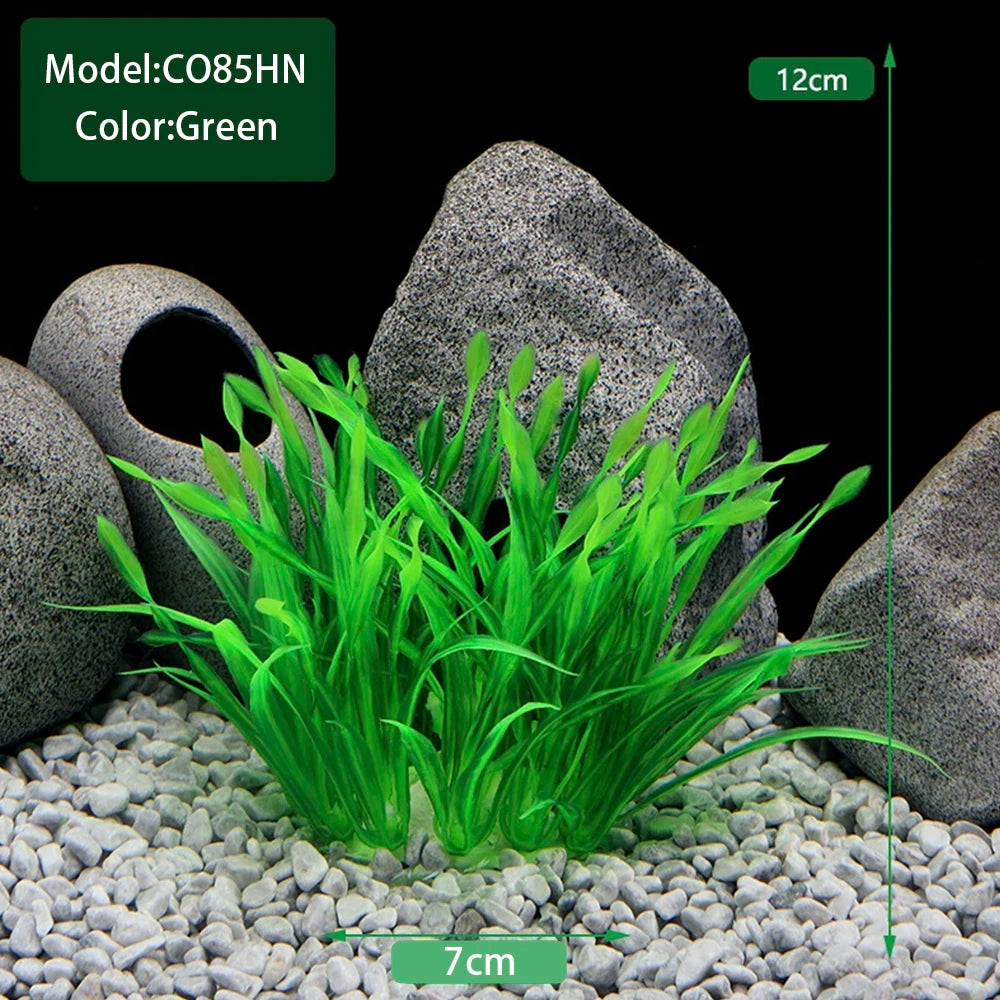 Green artificial aquarium plants growing in a rock environment