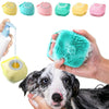 A hand is using a teal silicone pet bath massage brush to foam and wash a dog's fur.