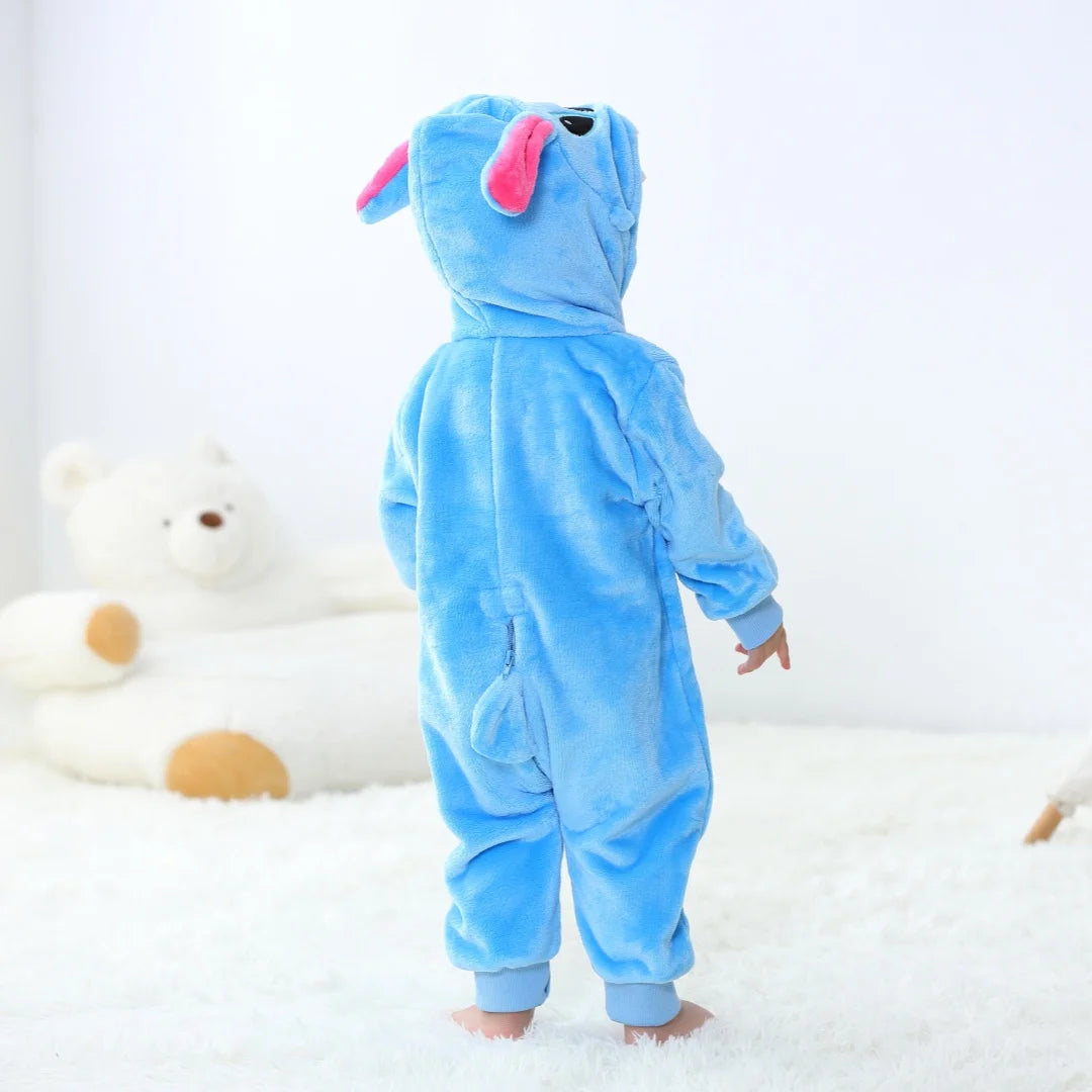 A bright blue cartoon animal hooded romper for babies and toddlers standing on a white fluffy surface.