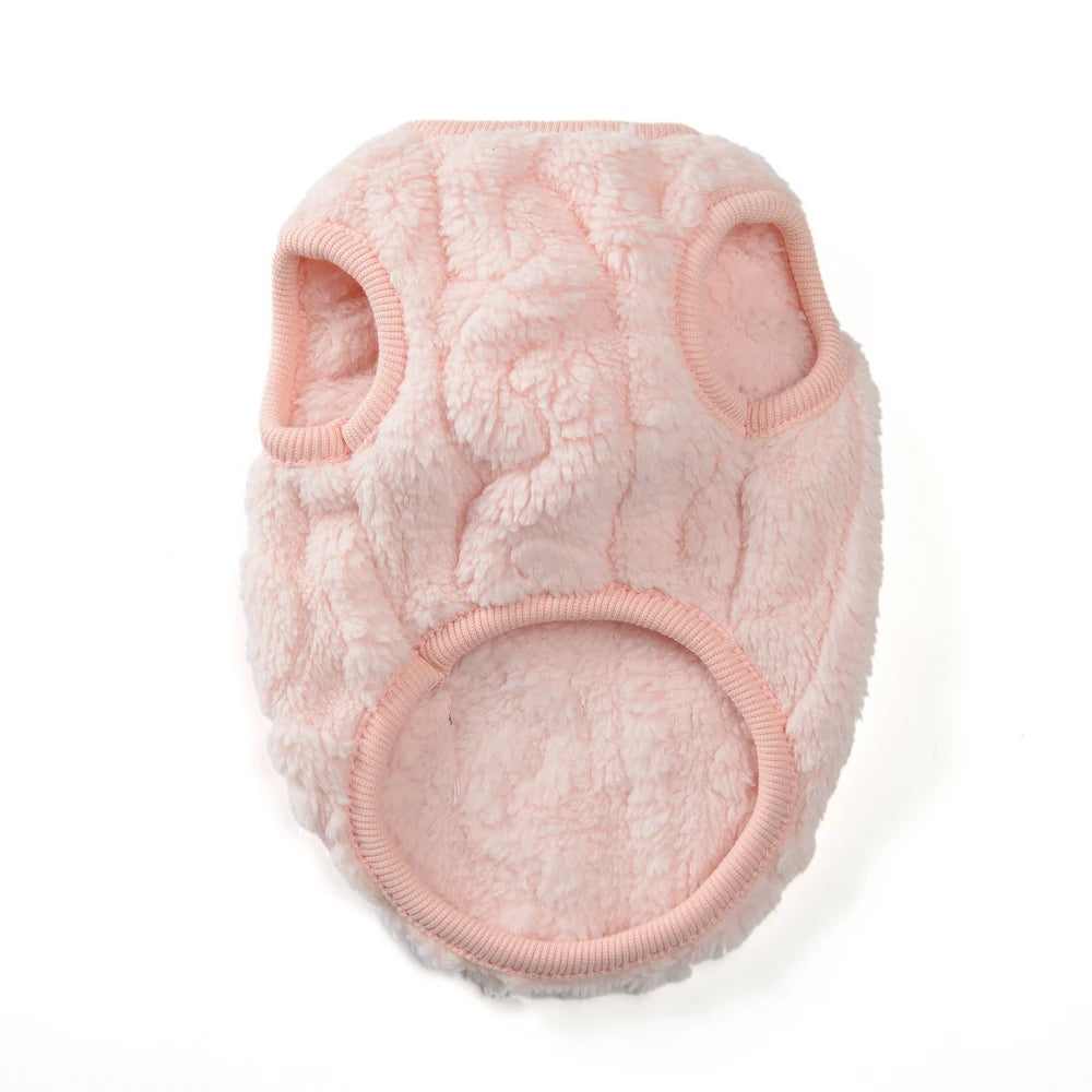 A pink, fluffy fleece dog sweater for small and medium breeds with rounded ears.