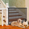 A black pet safety gate with wooden steps is installed on a white staircase railing.