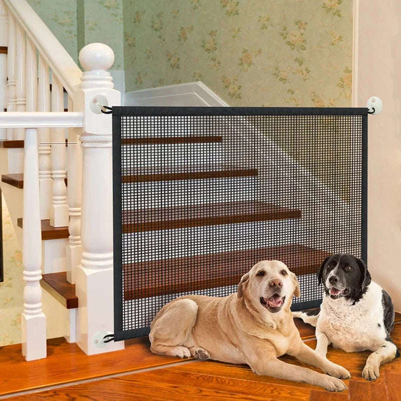 A black pet safety gate with wooden steps is installed on a white staircase railing.