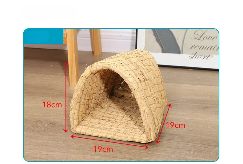 A natural straw woven mat shaped like a burrow for small rodents, shown on a wooden surface.