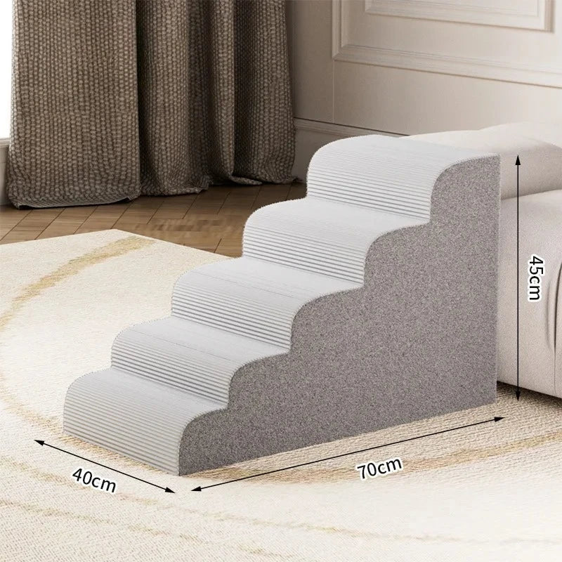 Escaleras y rampas de espuma gris para perros mostradas sobre una alfombra clara