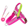 A bright pink dog harness and leash set with neon green accents and a checkered pattern.
