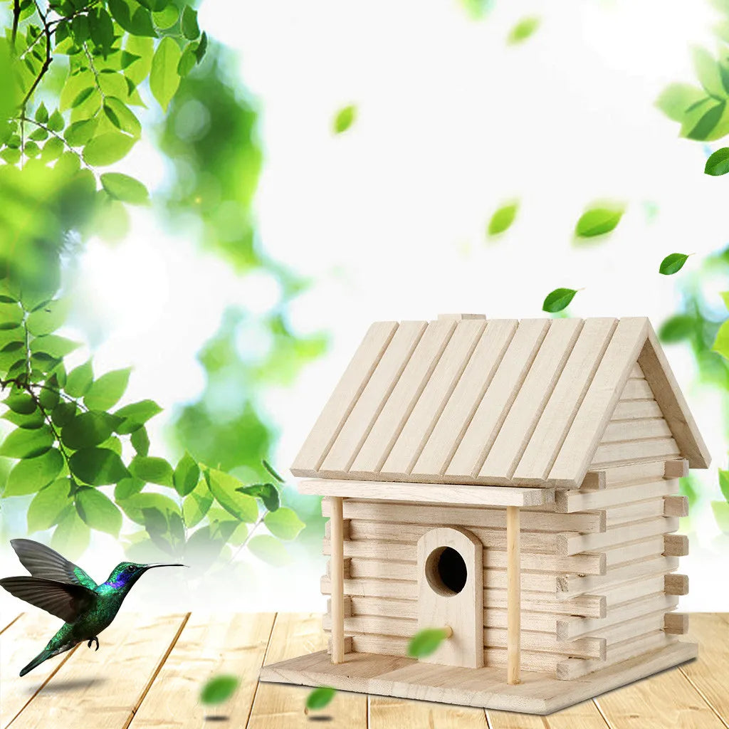 A wooden birdhouse with a pitched roof and entrance is shown outdoors against a bright, leafy green background.