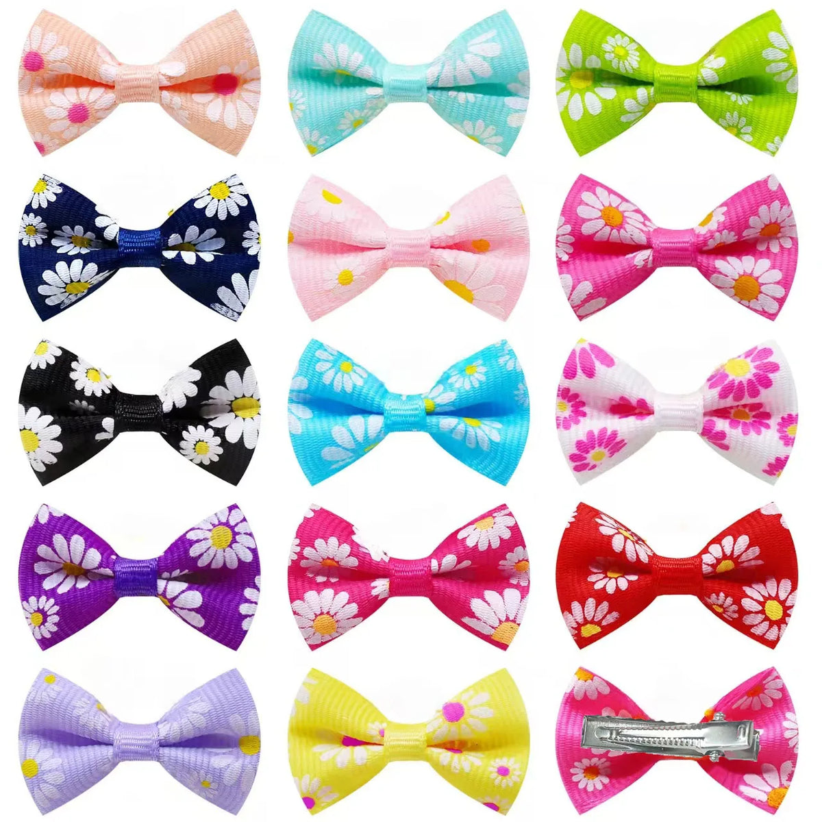 Colección de clips y lazos de pelo de mascotas coloridos para el aseo de perros y gatos, con varios patrones y colores.