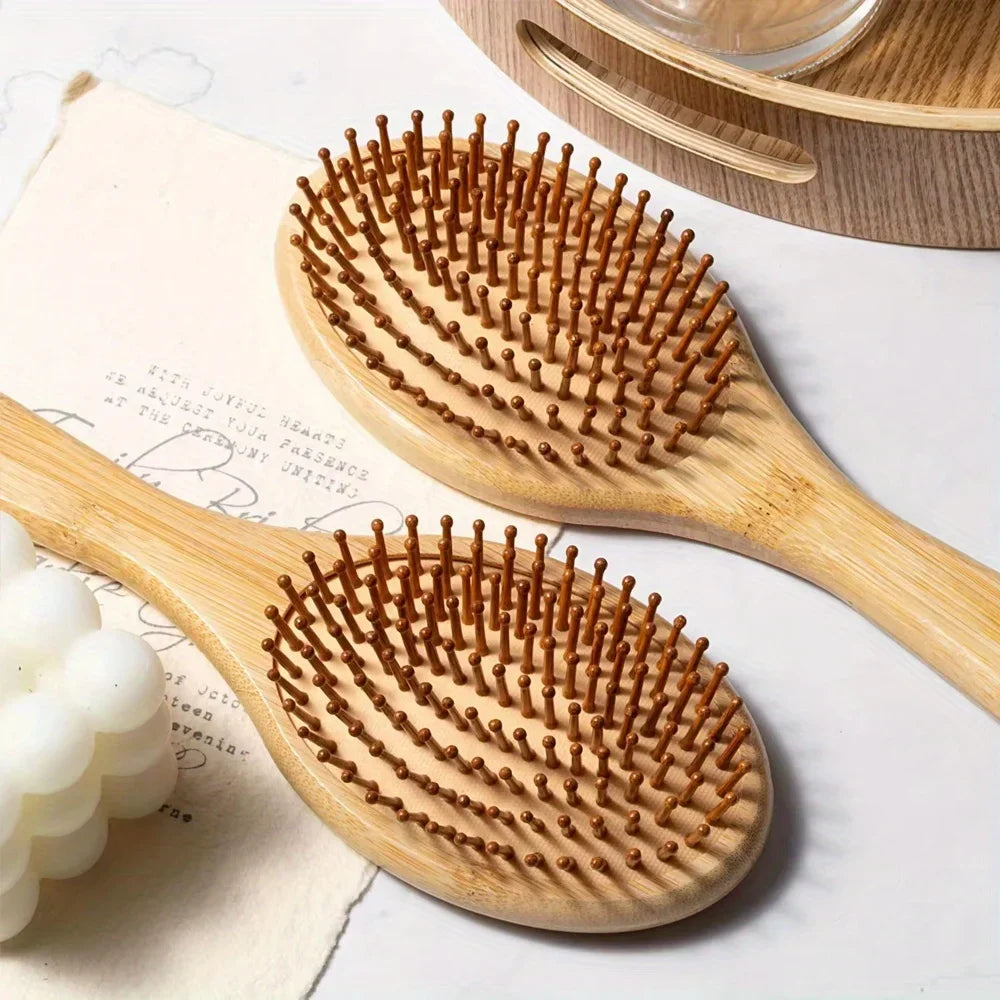 A wooden hair brush with massage bristles is shown next to a white foam product on a light background.
