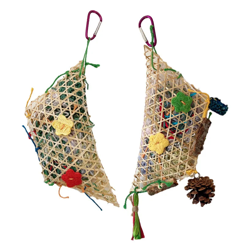 A handmade parrot foraging chewing toy with a bamboo frame and colorful shredded paper