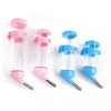 Three hanging drinker bottles in pink and blue for small pets