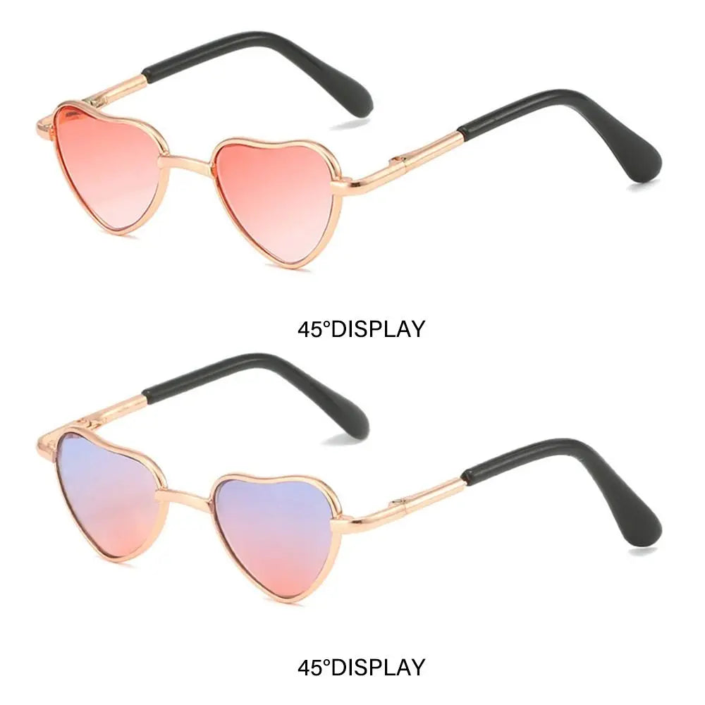 Pair of funny heart-shaped pet sunglasses for cats and dogs with rose gold frames