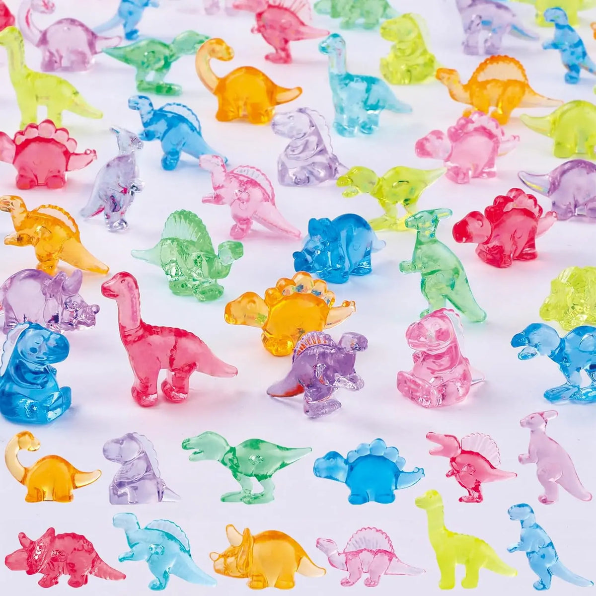Eine Sammlung farbenfroher Mini-Dinosaurierfiguren aus Harz in verschiedenen Schattierungen und Posen.