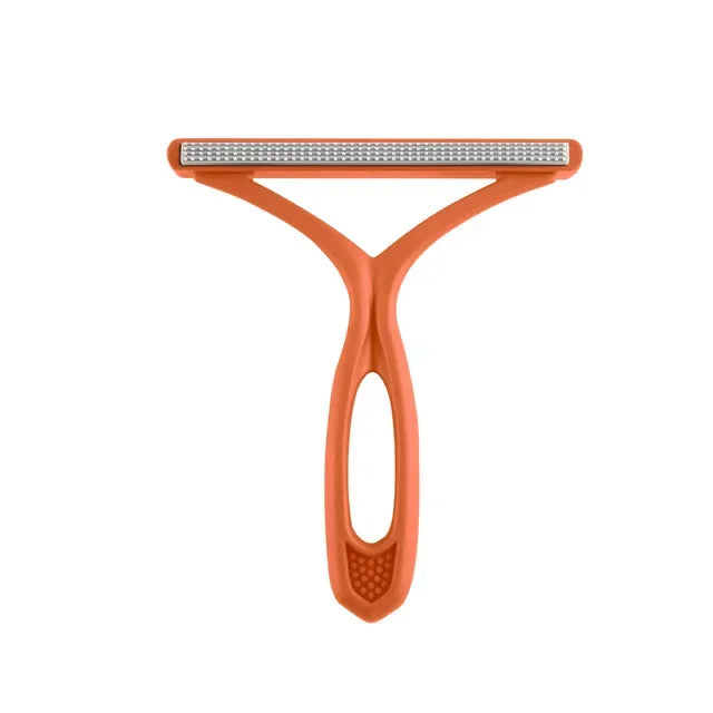 An orange 2-in-1 pet hair remover and fabric shaver tool with a flat shaving plate and a curved handle.