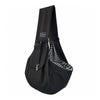 Black fabric crossbody pet carrier bag with a checkered pattern detail