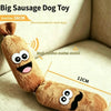 A plush sausage dog toy made of brown fabric with facial features and sound-making sections.