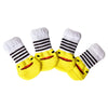 A pack of four yellow and white striped anti-scratch cotton pet socks for small dogs and cats.