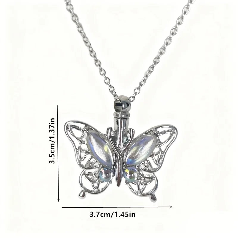 Silver butterfly ashes necklace featuring a detailed butterfly charm and chain.
