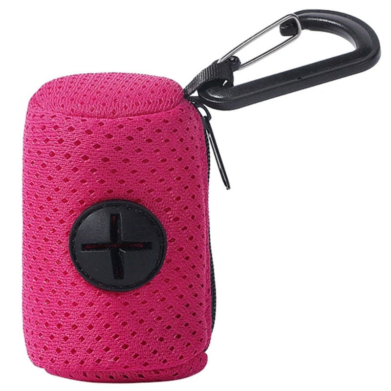 A bright pink pet waste bag dispenser with a black magnetic clip attached for easy carrying.