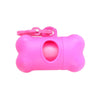 A bright pink bone-shaped poop bag dispenser with a clip.