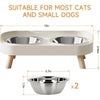 A beige elevated bowl set with two stainless steel bowls, suitable for cats and small dogs.