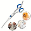 A pair of precision stainless steel pet grooming shears with blue handles and a close-up of them being used on a dog's fur.
