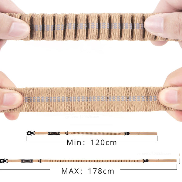 A close-up of a tan reflective bungee dog leash showing its length options and texture.