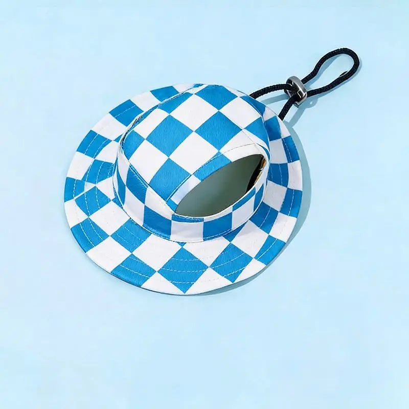 A blue and white checkered bucket hat with a black drawstring on a light blue background.