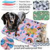 A pink pet training mat featuring various fabric types and a cat sitting on the mat.