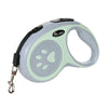 Laisse de chien/chat en nylon gris clair rétractable avec accent vert et poignée, pour petits et moyens chiens et chats.