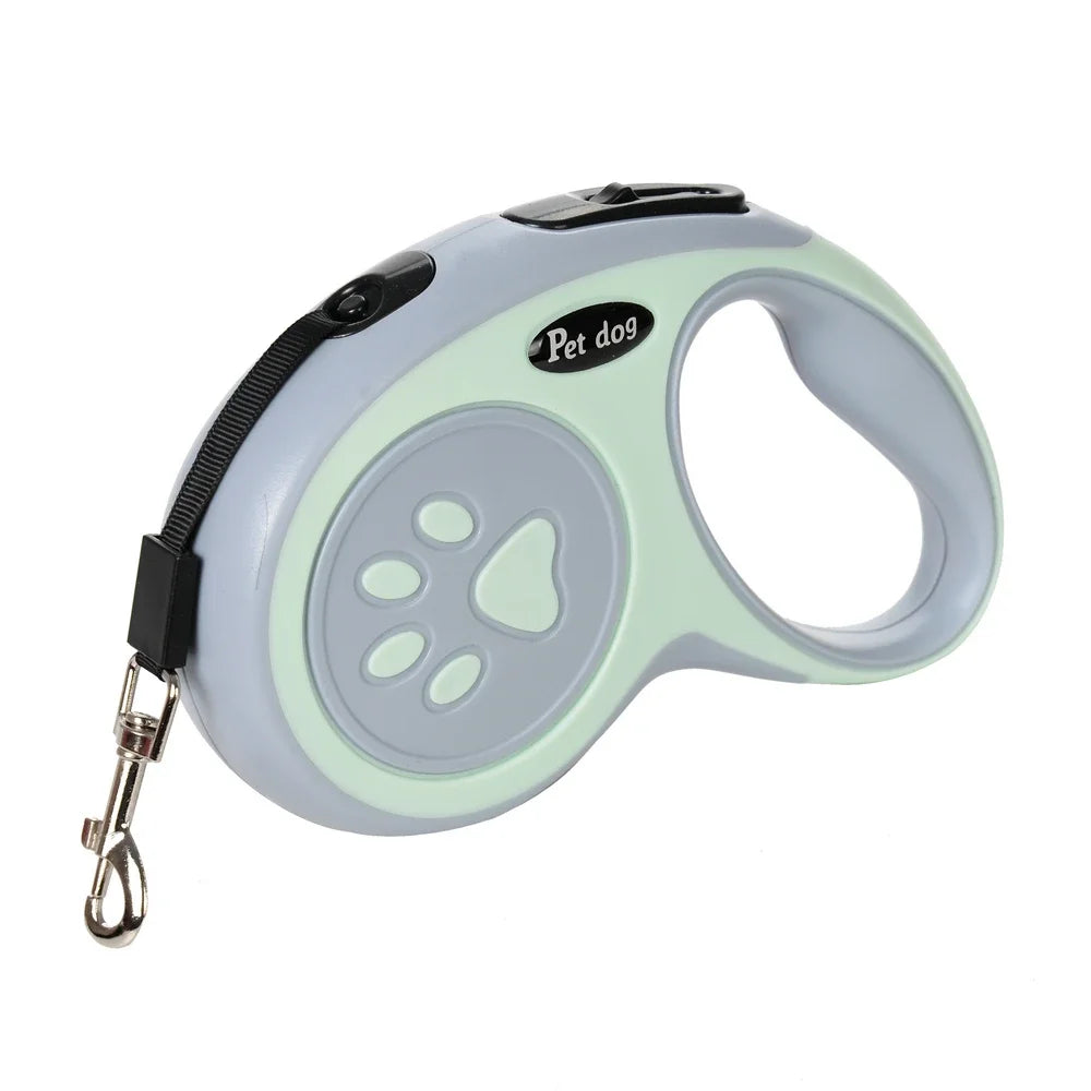 Correa retráctil de nylon gris claro para perro, con acento verde y correa negra.