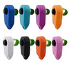 A set of colorful pet training clickers in various plastic colors including blue, teal, purple, orange, white, and black.