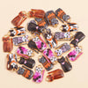 A collection of colorful cat and animal pendant charms for jewelry making, featuring various patterns and colors.
