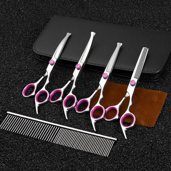 A set of professional stainless steel dog grooming scissors and a comb displayed on a black case.