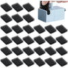 A collection of black replacement foam filters for pet water fountains shown next to a device.