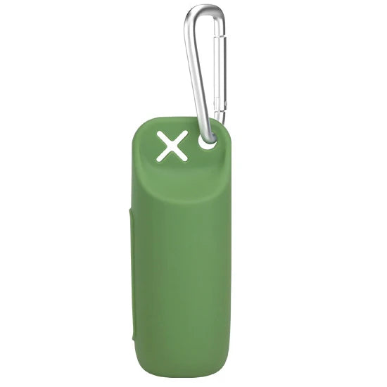 A green silicone dog poop bag dispenser with a silver clip.