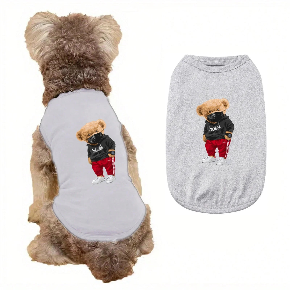 A gray printed vest for a dog is shown next to its fur, featuring a small teddy bear graphic.