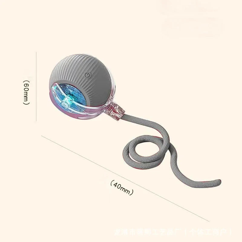 A gray interactive rechargeable cat toy ball with a clear light and flexible cord.