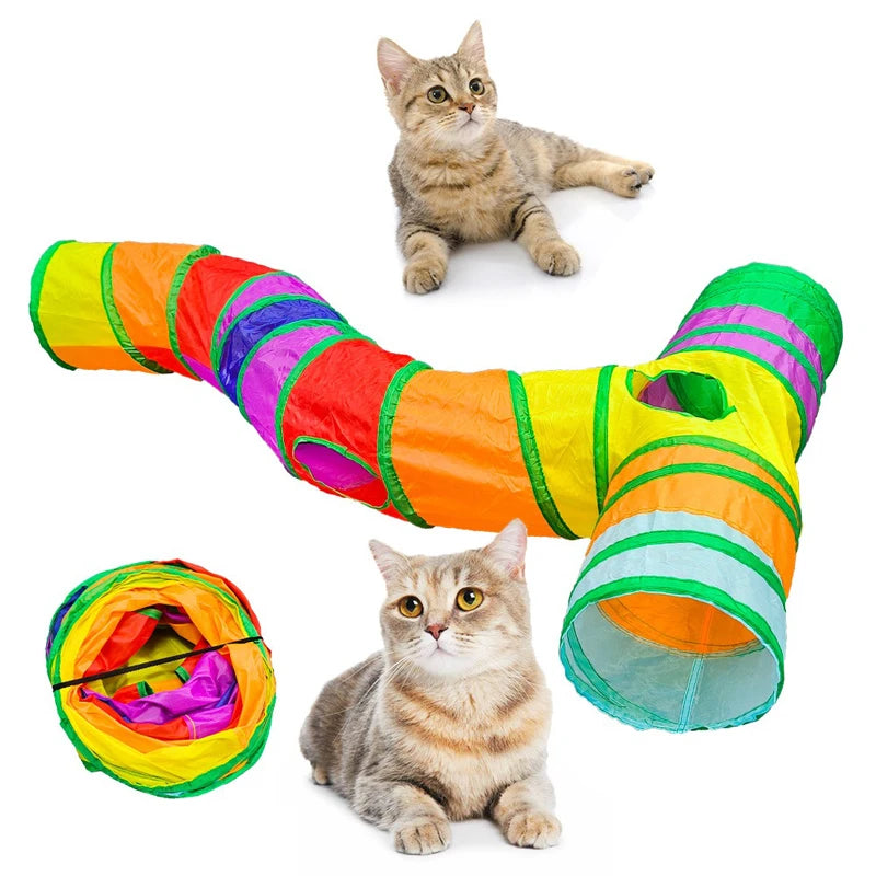 A tabby kitten is shown playing inside a colorful, flexible cat play tunnel.
