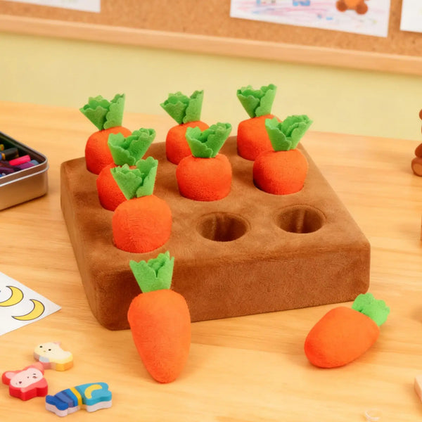 An interactive snuffle mat for pets shaped like carrots, featuring orange and green textures.