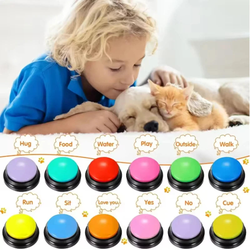 A set of colorful recordable pet communication buttons for dog training, arranged in a grid.