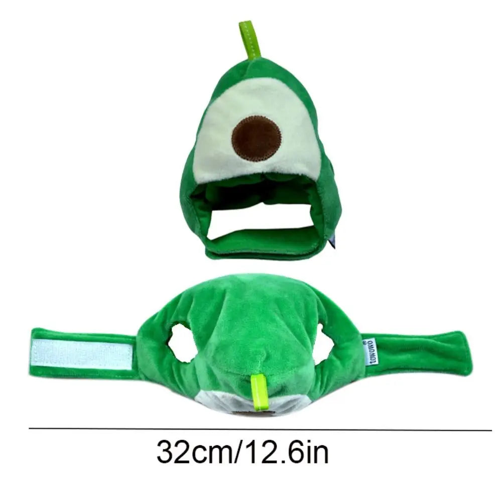 A green avocado-shaped pet hat for cats and dogs with a brown eye patch