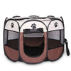 A portable foldable pet playpen with a mesh enclosure and padded base.