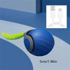 A blue electric cat ball toy is shown rolling on a surface, with a diagram of its charging port.